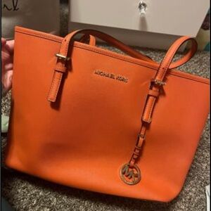 orange michael kors purse